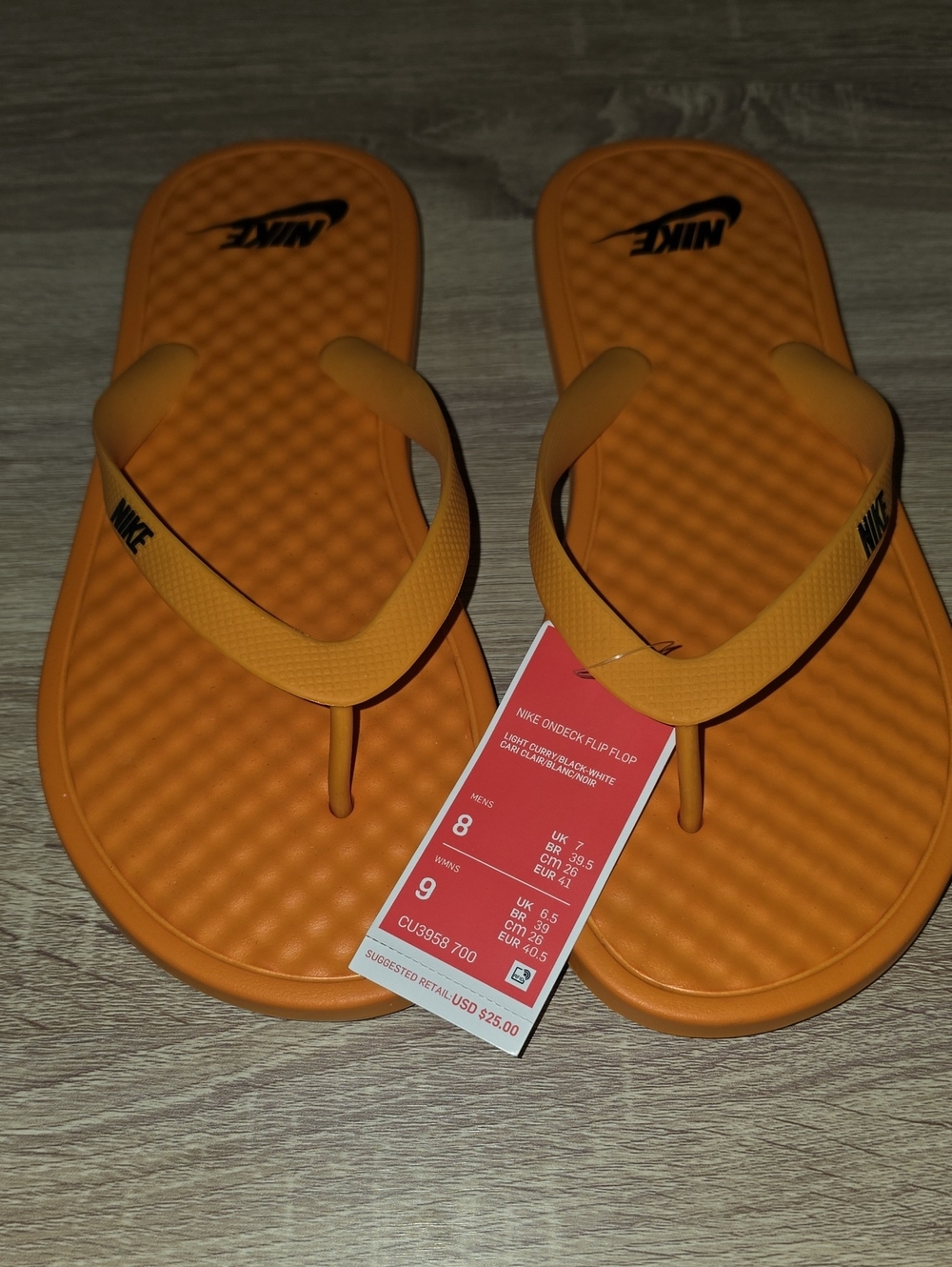 Nike Orange Men's Flip Flop Sandals with Black Logo